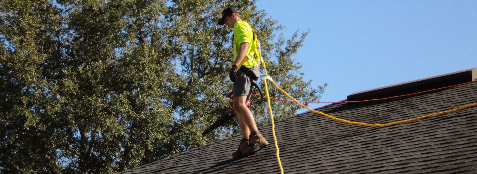 man working on a roof