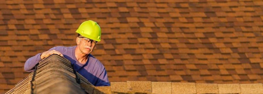 man on a roof